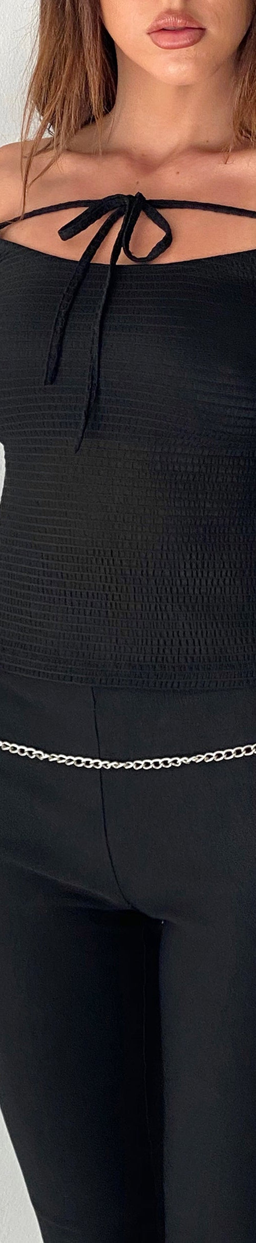 Image of Alondra Long Sleeve Tie Front Top in Textured Black