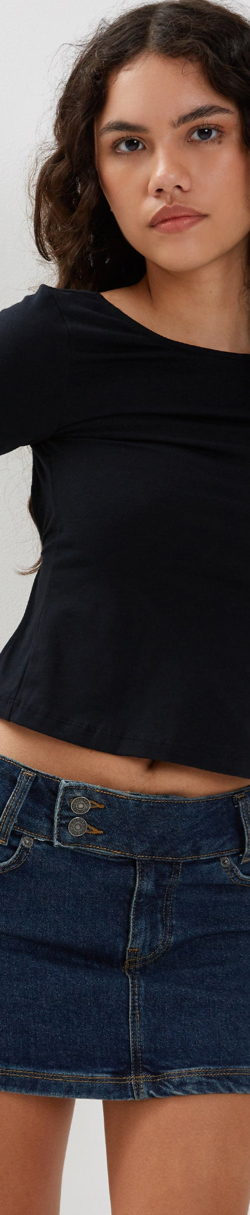 Image of Low Rise Denim Mini Skirt in Dark Vintage Wash