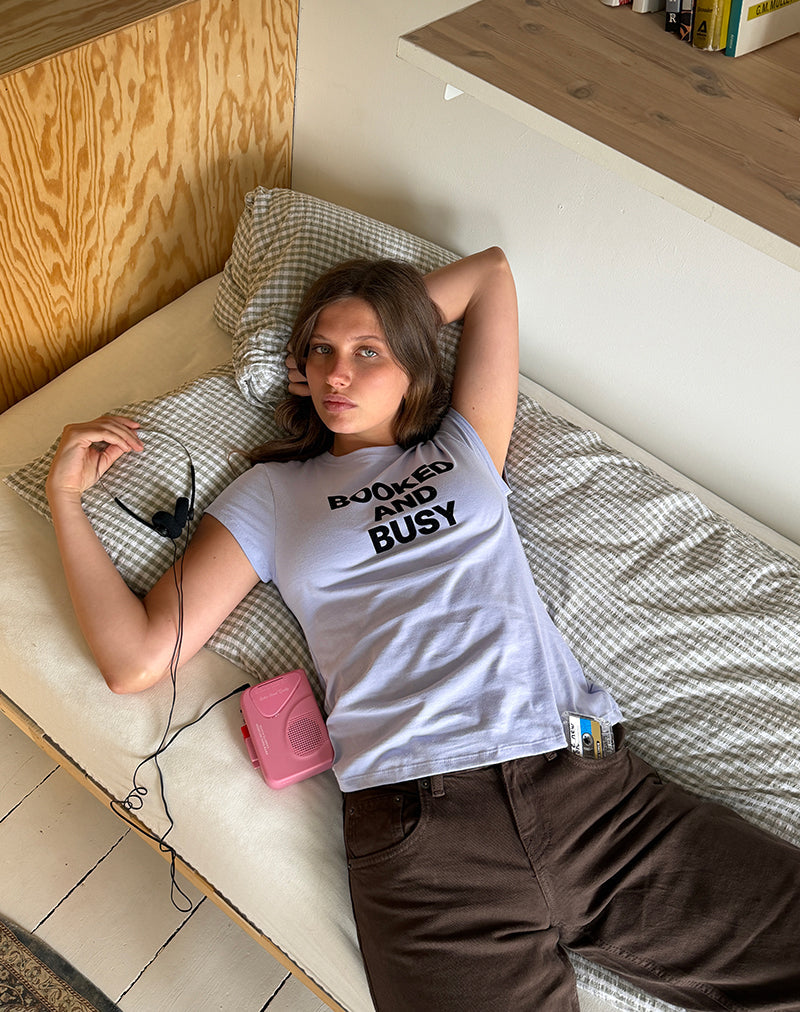 Image of Clio Baggy Tee in Lilac with Booked and Busy Slogan