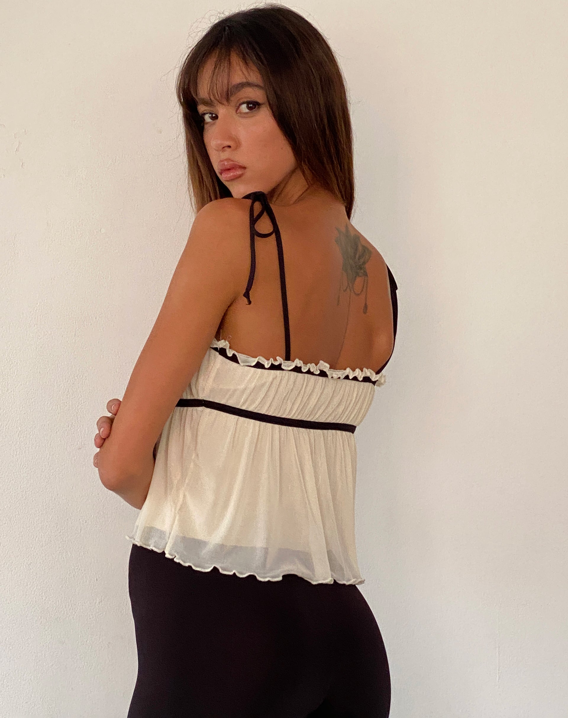 Image of Damaris Frill Cami Top in Cream with Black Centre Bow