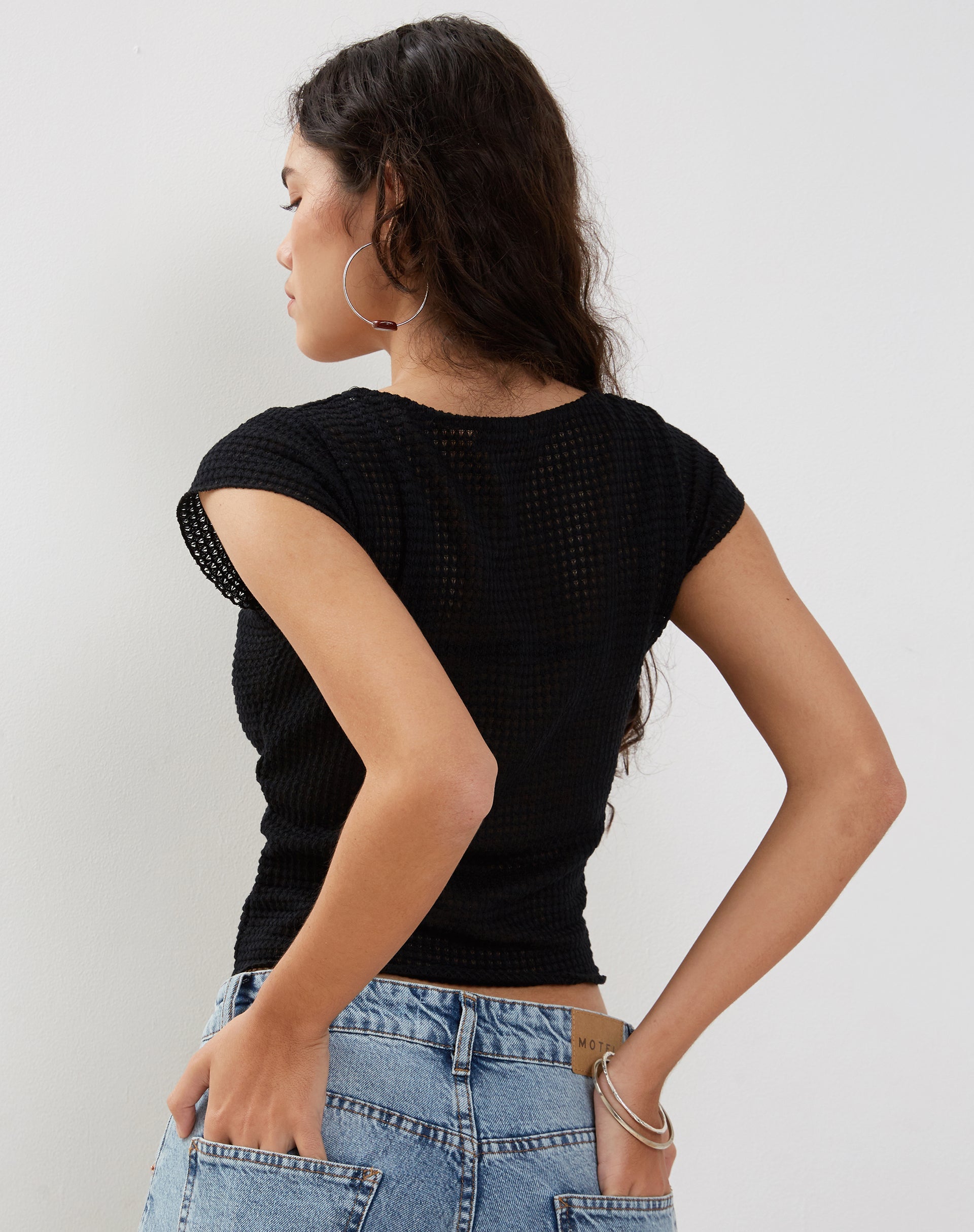 Image of Gianina Crop Top in Black Textured Crochet