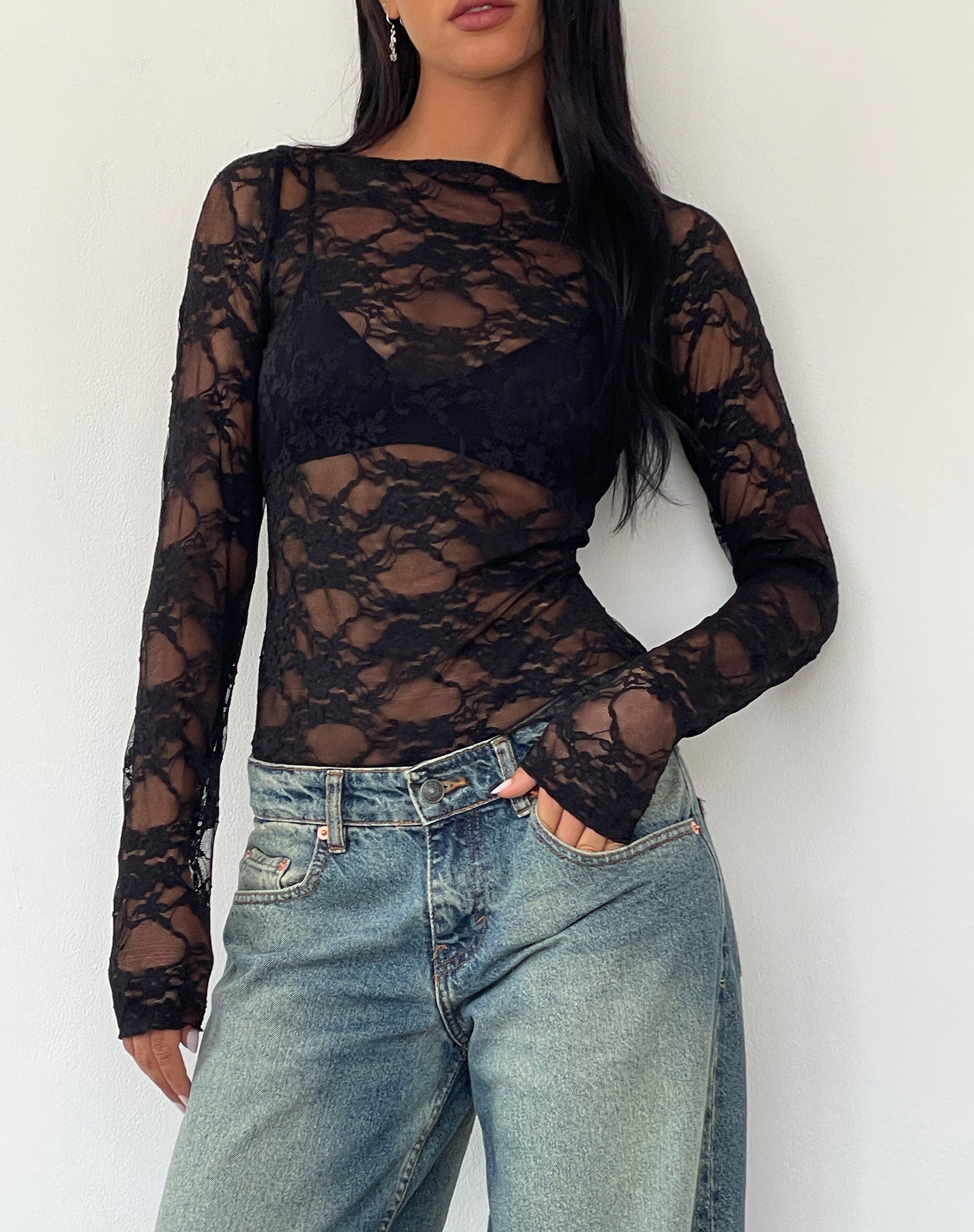 https://us.motelrocks.com/cdn/shop/files/GRIZELDA-TOP-ABSTRACT-LACE-BLACK-_-ROOMY-EXTRA-WIDE-LOW-RISE-JEANS-EXTREME-BLUE-GREEN.jpg?crop=center&height=2428&v=1698319083&width=1920