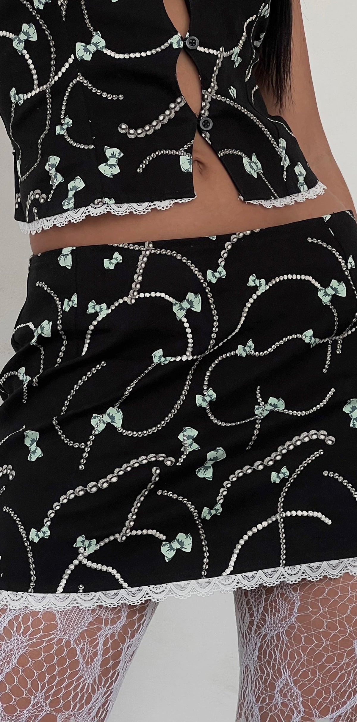 Black Mini Skirt with Pearl and Bow Print | Molen – motelrocks-com-us
