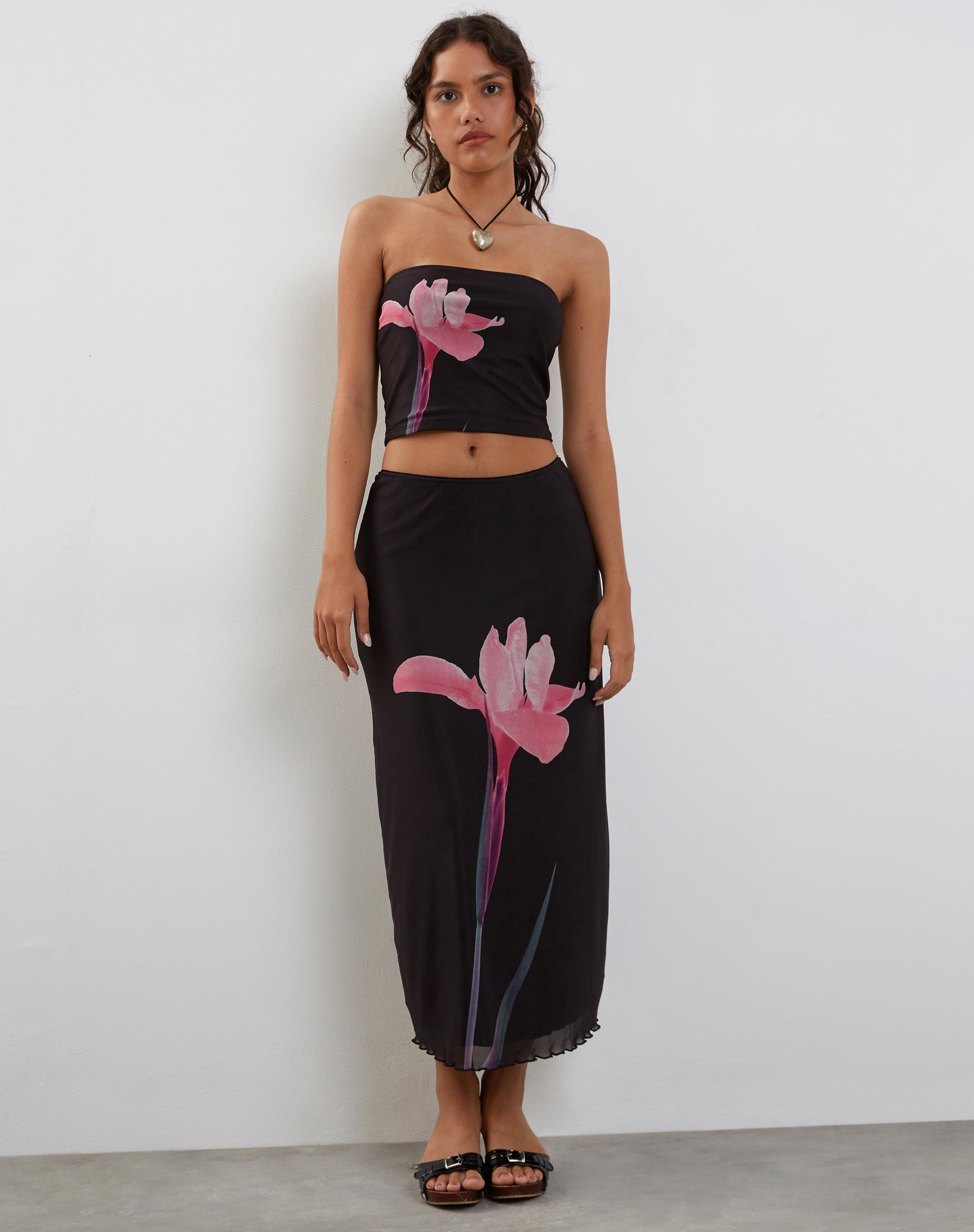 Image of Lassie Midi Skirt in Black with Pink Flower Placement
