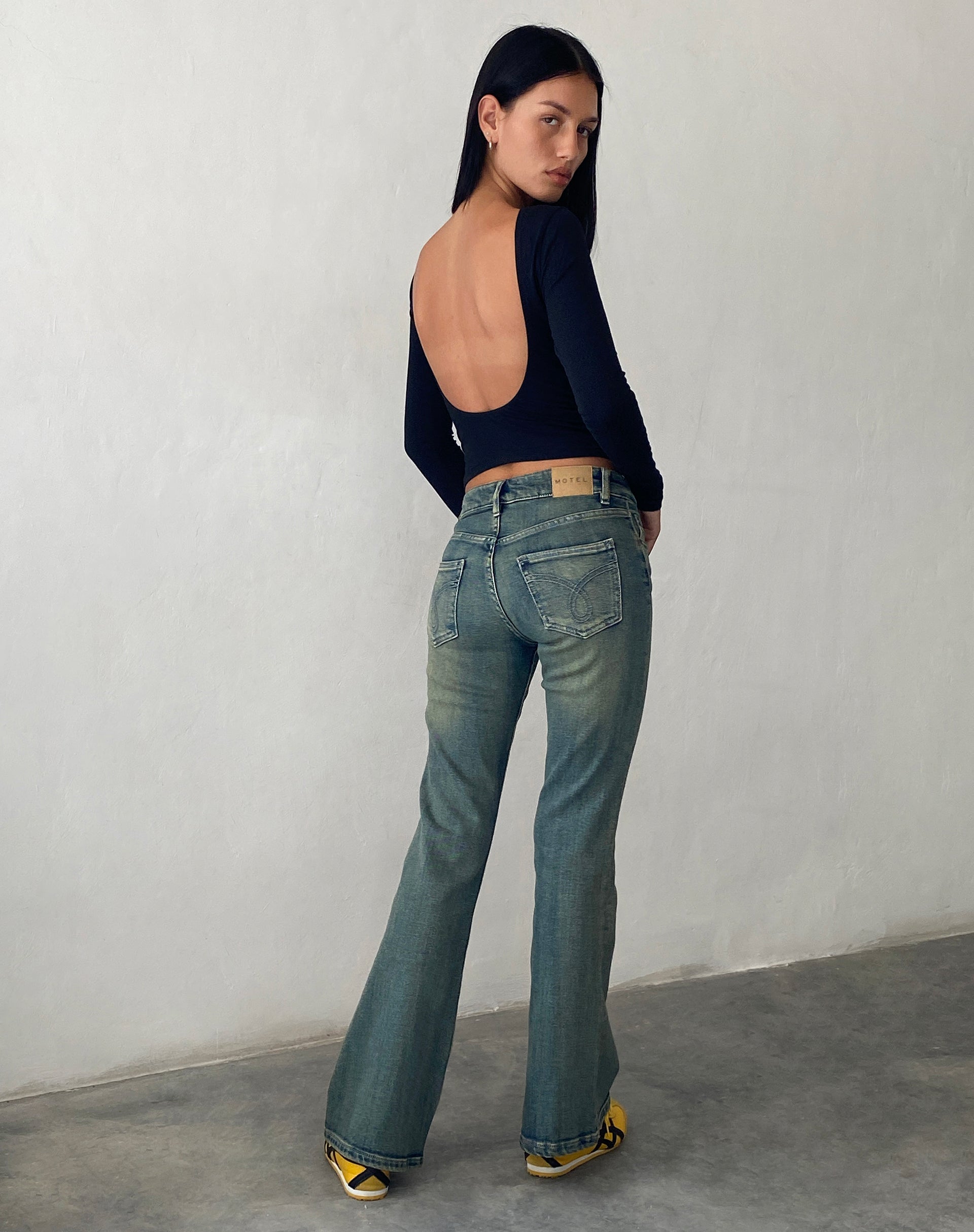 10 Ways to Wear Flared Jeans That Feel Modern and Fresh | Classic denim  jacket, Double denim looks, Denim street style