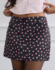 Image of Maula Mini Skirt in Black Satin Scattered with Pink Polka