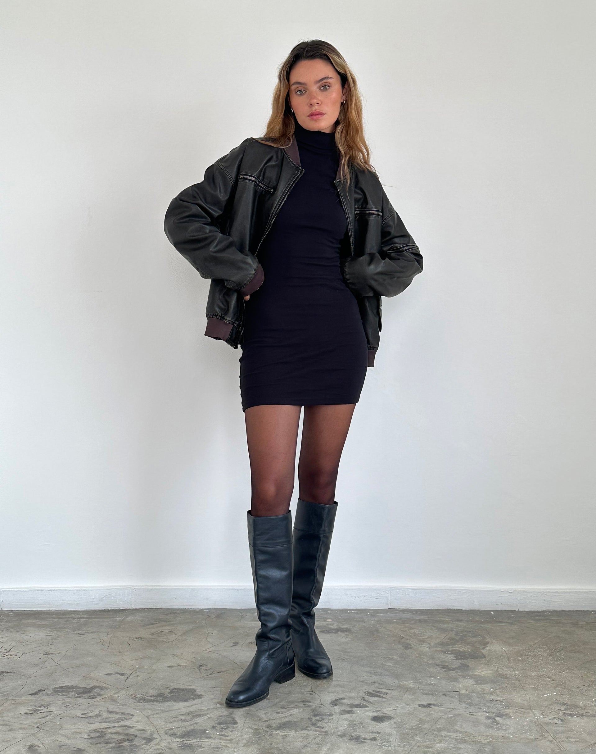 Yrion Turtle Neck Bodycon Mini Dress in Black