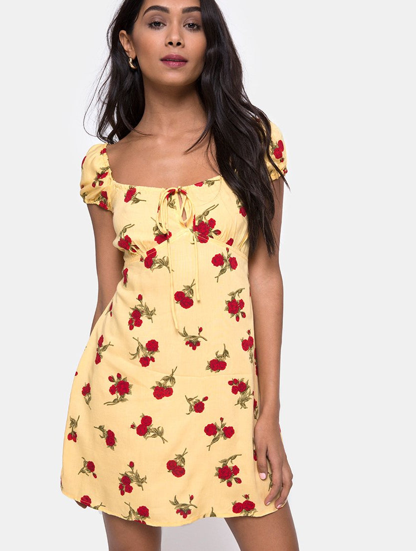 Vivacious Yellow Polka Dot Ruched Mini Dress with Rose Accents main image 0