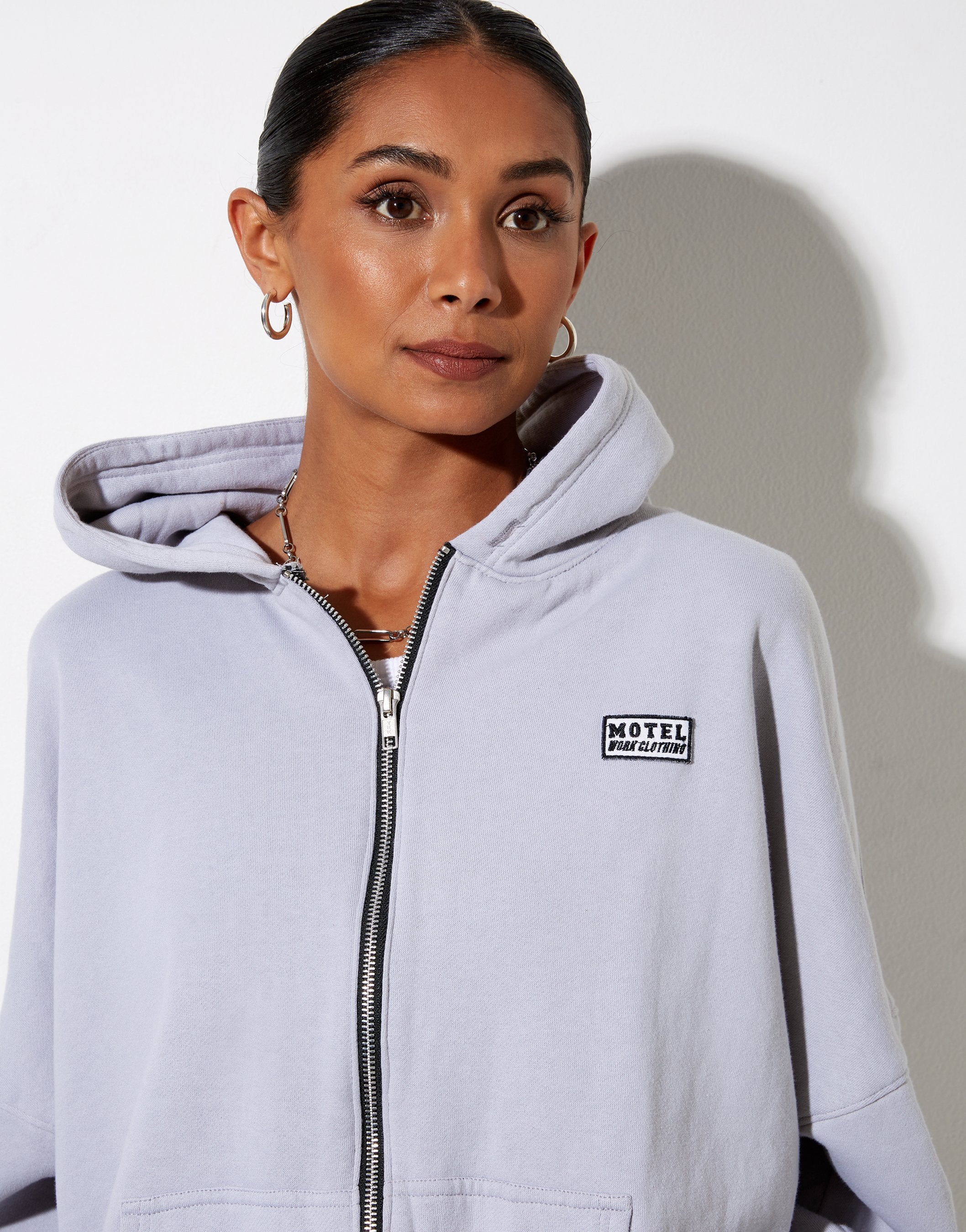Image of Hollack Hoodie in Lunar Rock with Motel Work Clothing Label Embro