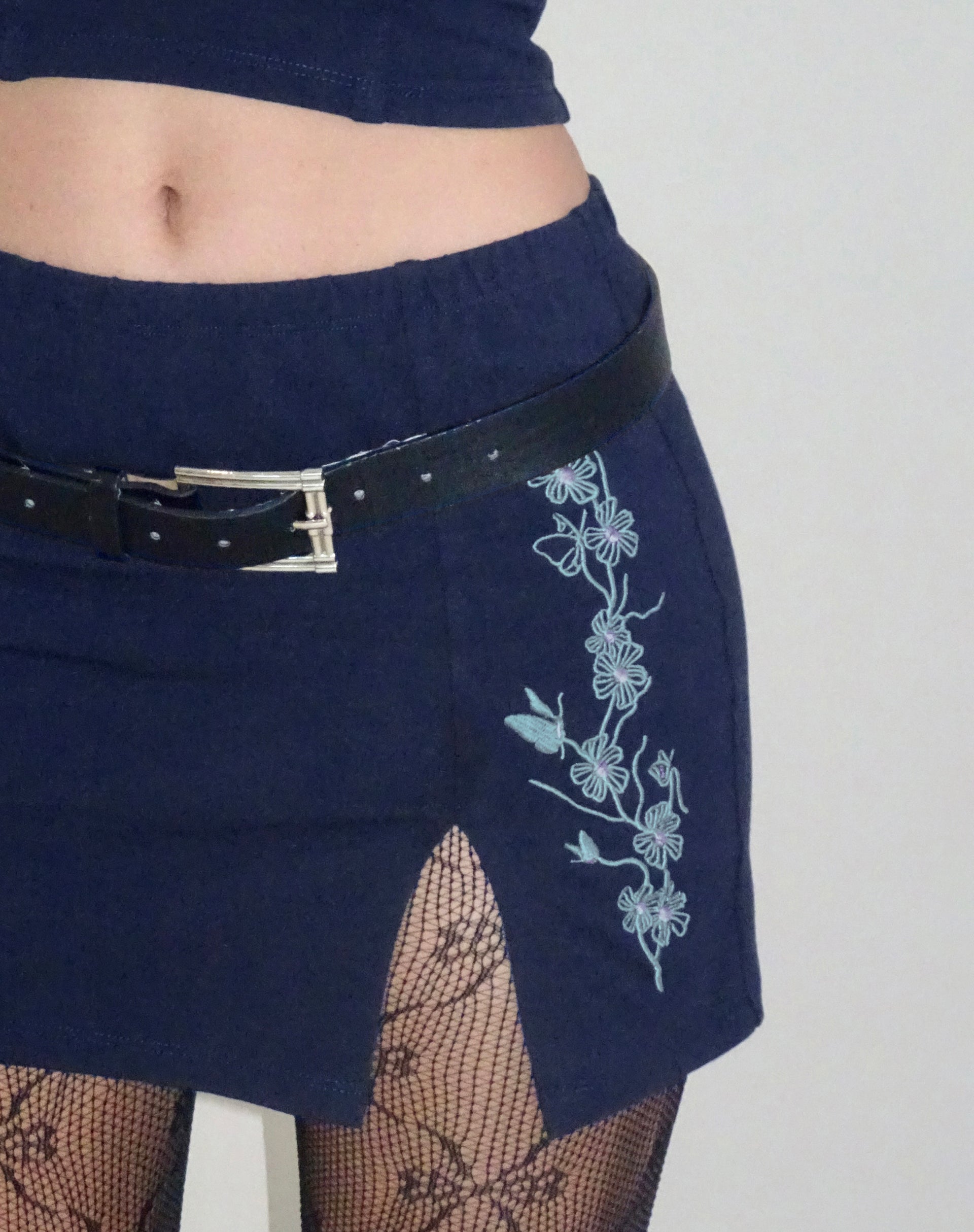 image of Lael Mini Skirt in Navy Flower Butterfly Emb