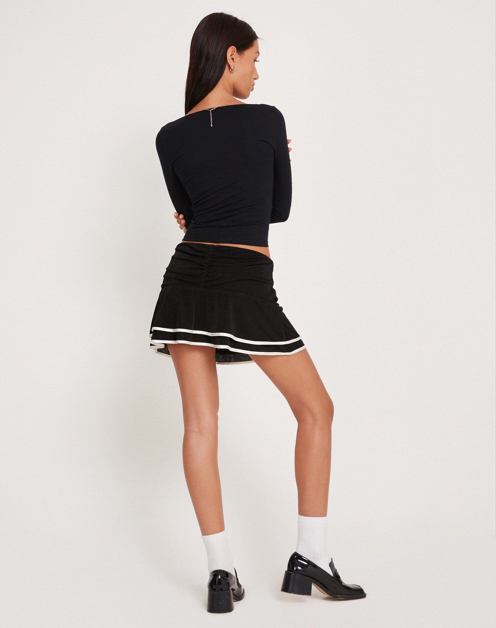 Image of Ranta Mini Skirt in Black with Ivory Binding
