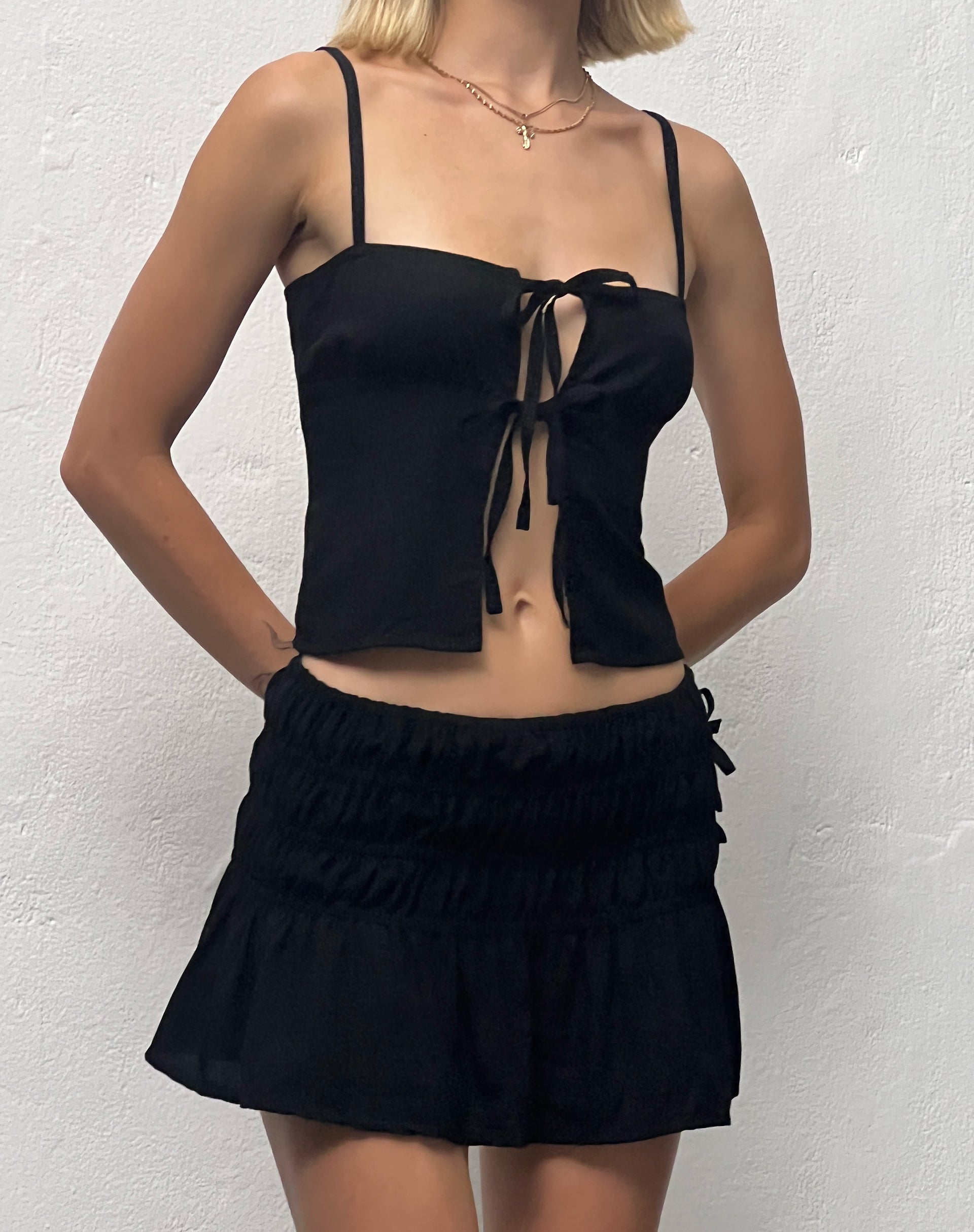 Image of Rikako Shirred Mini Skirt in Black